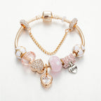 Gold Toned Bracelet with Peach Hearts & Diamond Accents