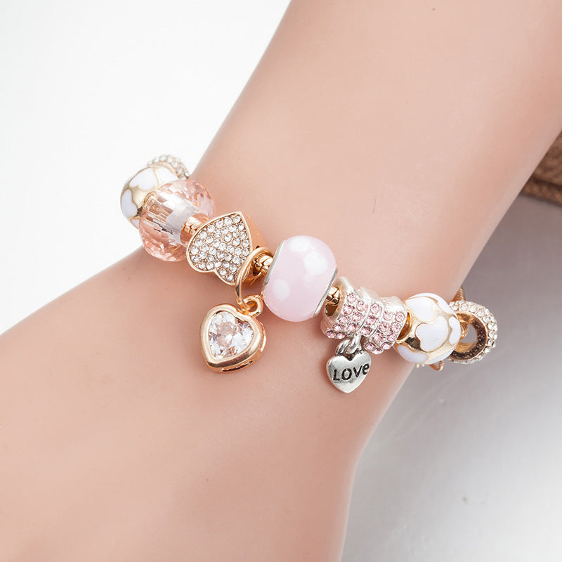 Gold Toned Bracelet with Peach Hearts & Diamond Accents