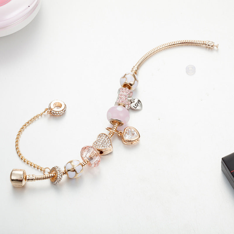 Gold Toned Bracelet with Peach Hearts & Diamond Accents