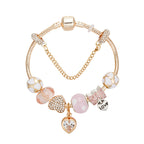Gold Toned Bracelet with Peach Hearts & Diamond Accents