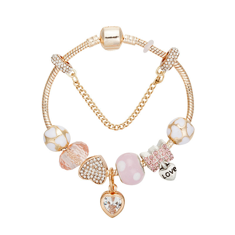 Gold Toned Bracelet with Peach Hearts & Diamond Accents
